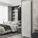 Стальной вертикальный радиатор отопления Warmmet Luxe 60V длина 1000 мм секций 4 цвет белый  тип подключения: нижнее правое