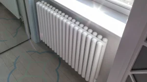 Трубчатый радиатор KZTO Гармония С40 2-750-21 / 21 секц.,   2-трубный, высотой 808 мм., шириной 1051 мм., боковое подключение, цвет белый