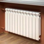 Биметаллический радиатор Rifar MONOLIT 300 - 14 секций,  высотой 365 мм., шириной 1120 мм., боковое подключение, цвет белый